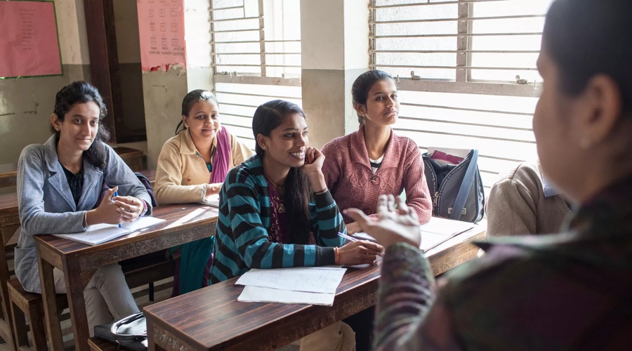 Students learn about information technology in New Delhi, India, as part of job training classes.