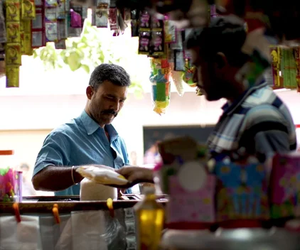 A banking customer goes shopping in India.