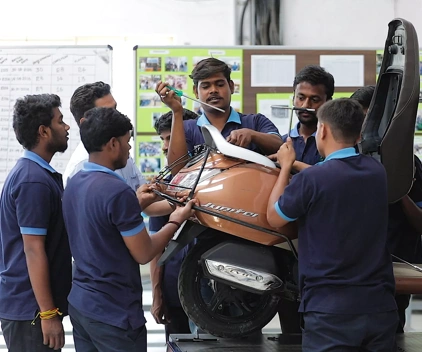 Mechanics working on a bike.